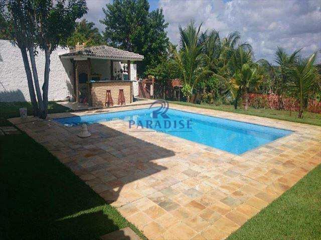Casa em Guarajuba no Condomínio Paraíso — 5 suítes, piscina e terreno amplo — foto 1